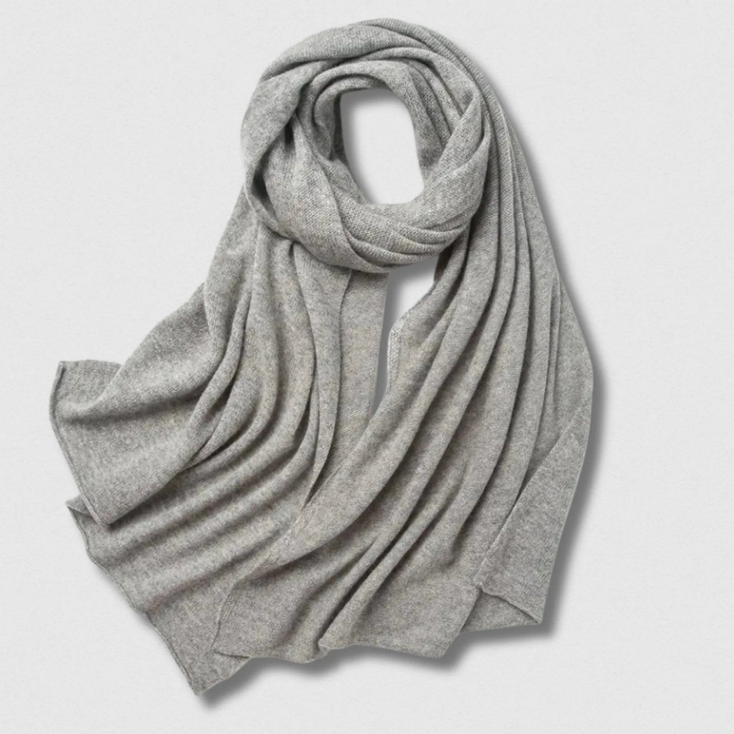 Écharpe 100 % laine gris clair 180×32 cm, confort doux et teinte neutre élégante.