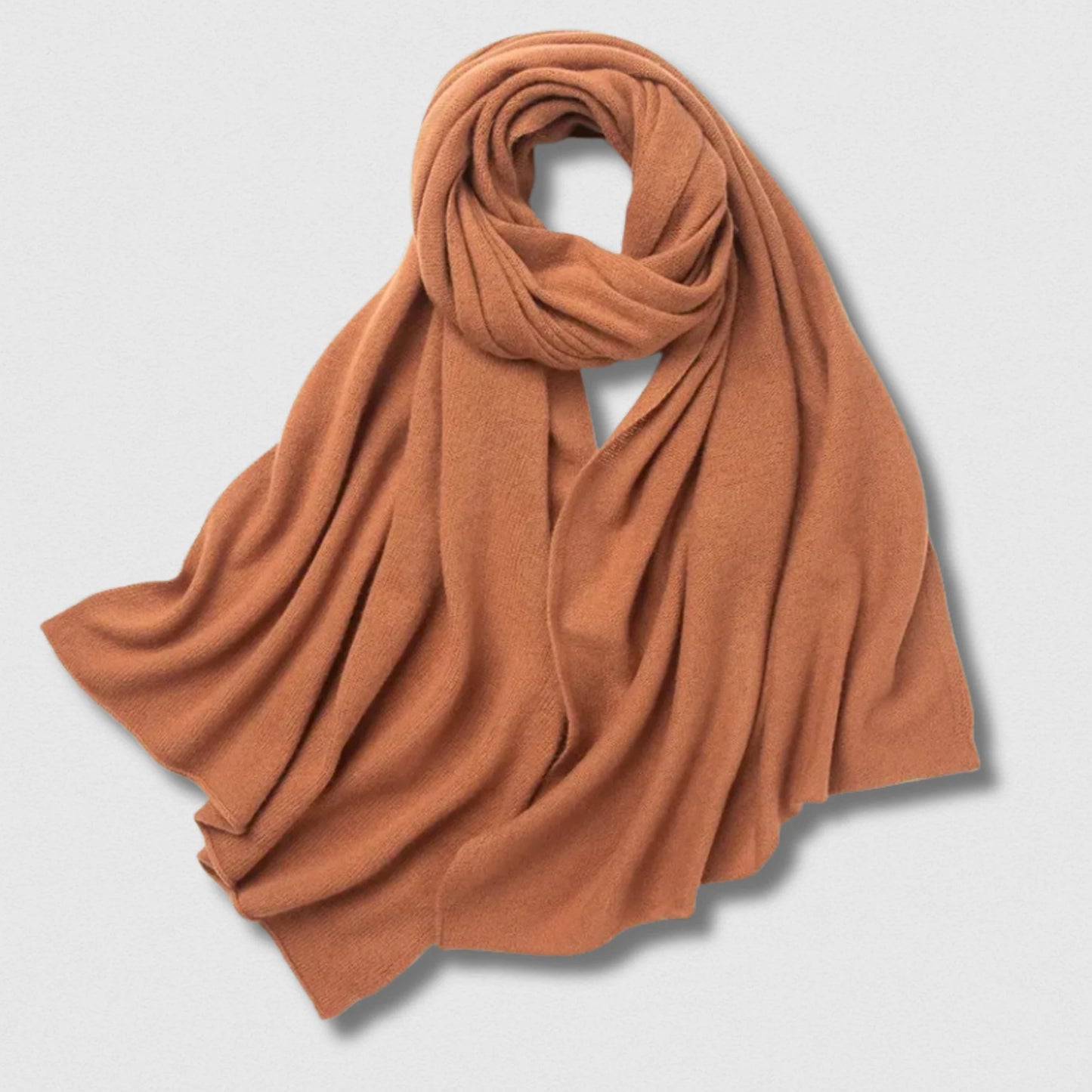 Écharpe 100 % laine orange terre cuite 180×32 cm, chaleur vive et confort automnal.