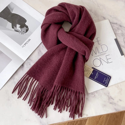 Écharpe 100 % laine bordeaux prune 180×32 cm, texture laine respirante.